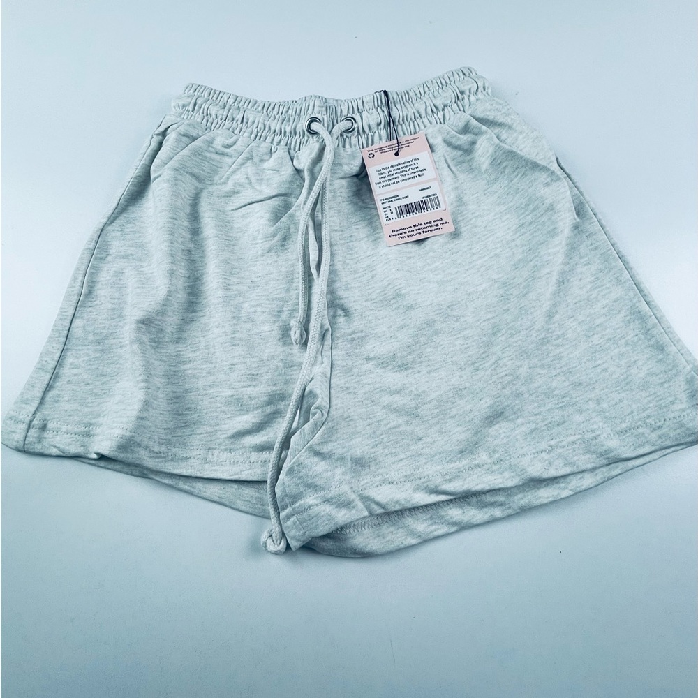 WHIE MARL RUNNER SHORT
WHITE